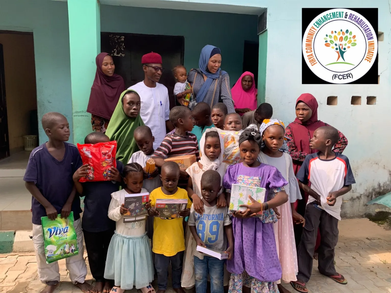 Children and community members gathered during FCER outreach